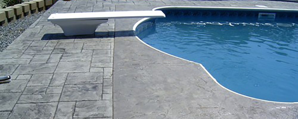 Big Dog Concrete - Stamped concrete pool deck